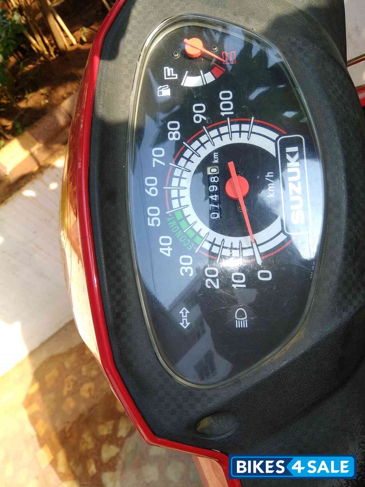 Red Suzuki Lets 110