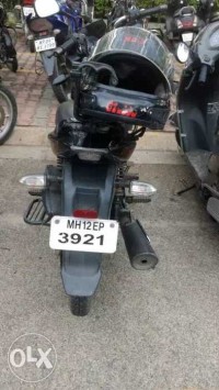 Black Bajaj XCD 125 DTS-Si