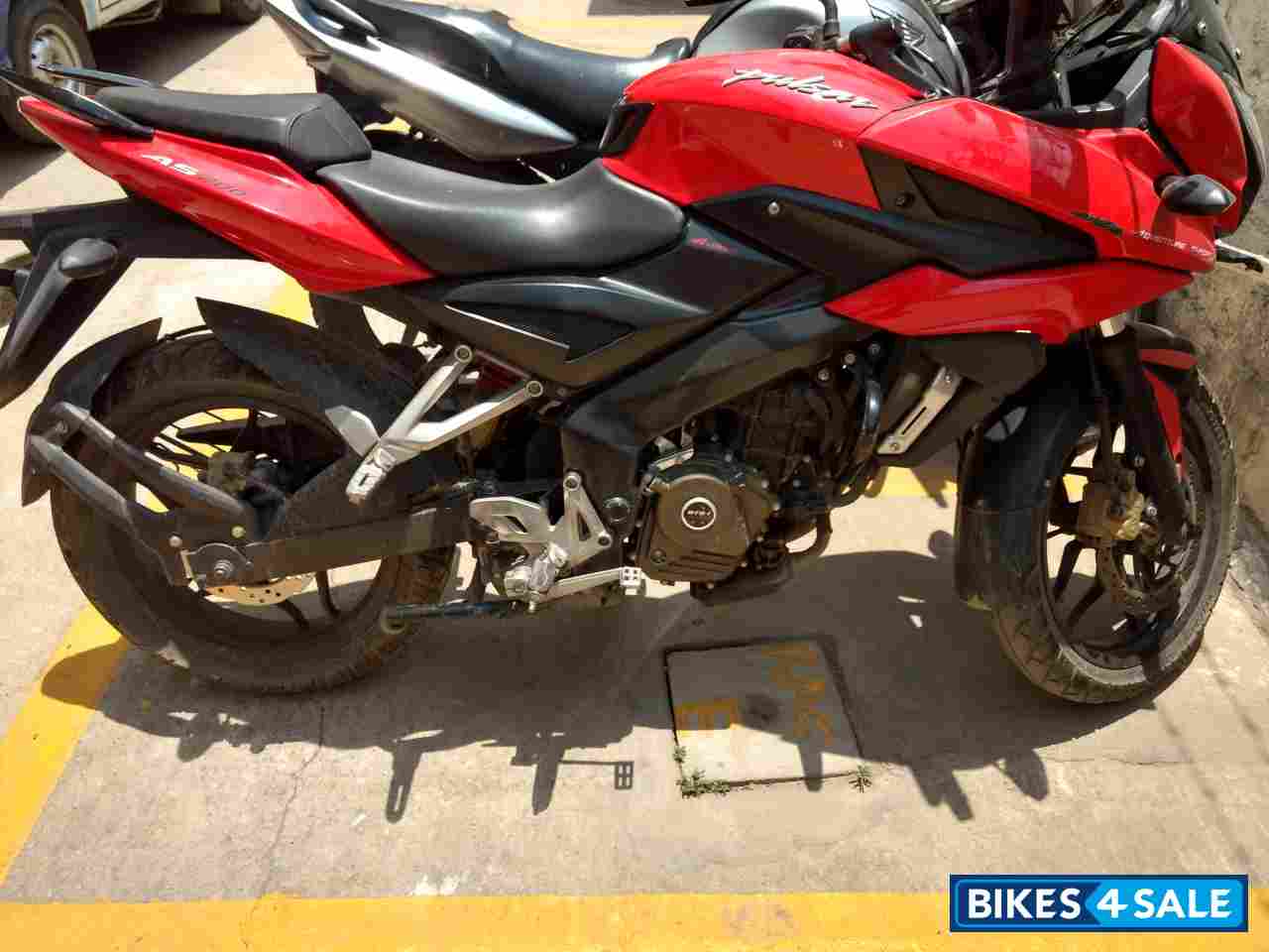 Red Bajaj Pulsar AS 200