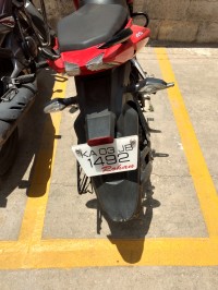 Red Bajaj Pulsar AS 200