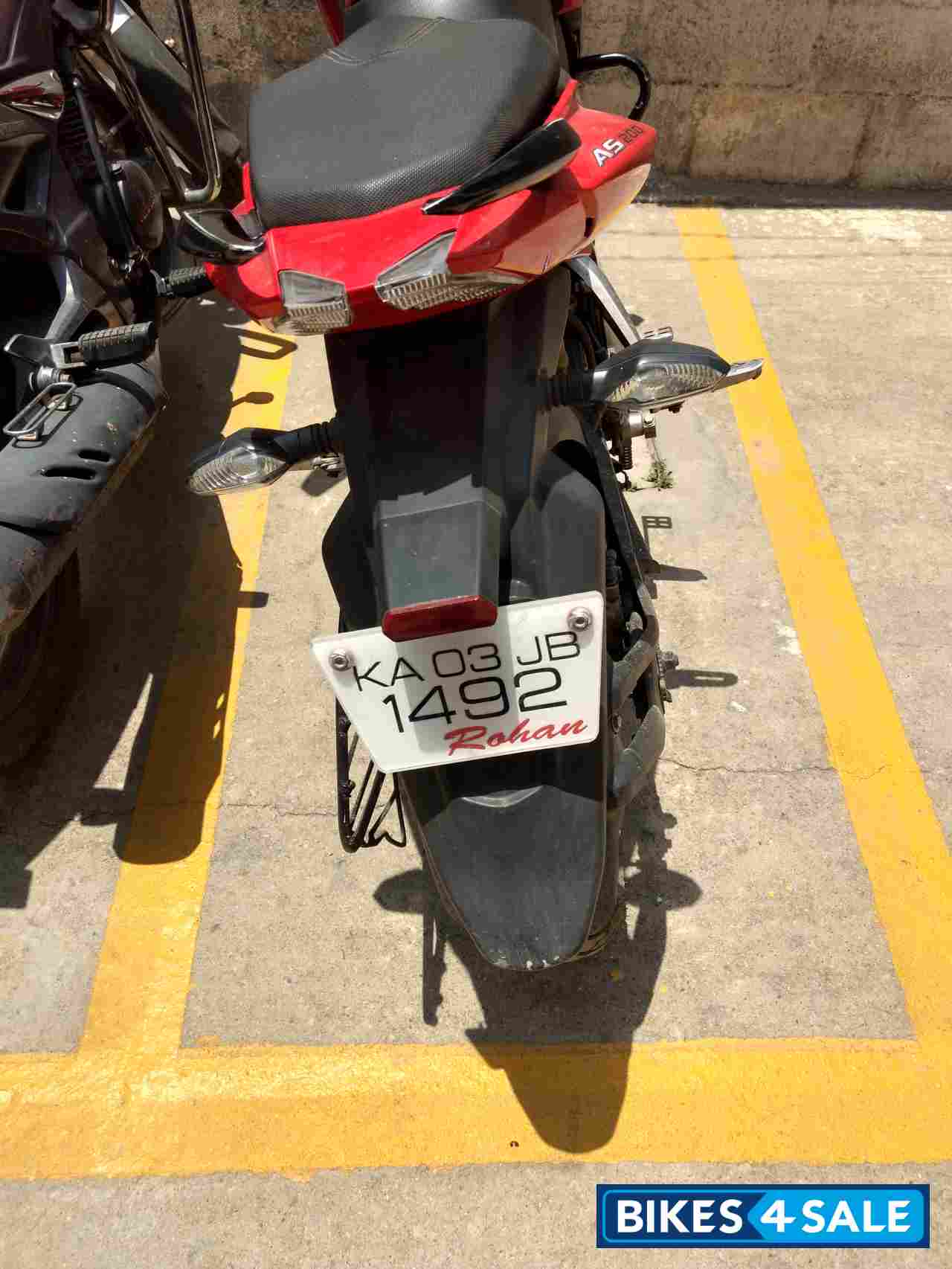 Red Bajaj Pulsar AS 200