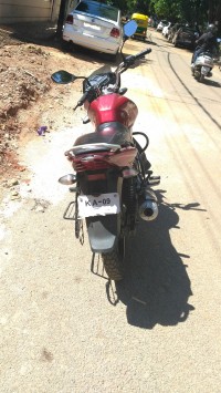 Red Bajaj Discover 100T