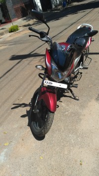 Red Bajaj Discover 100T