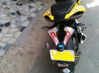 Yellow Bajaj Pulsar RS 200