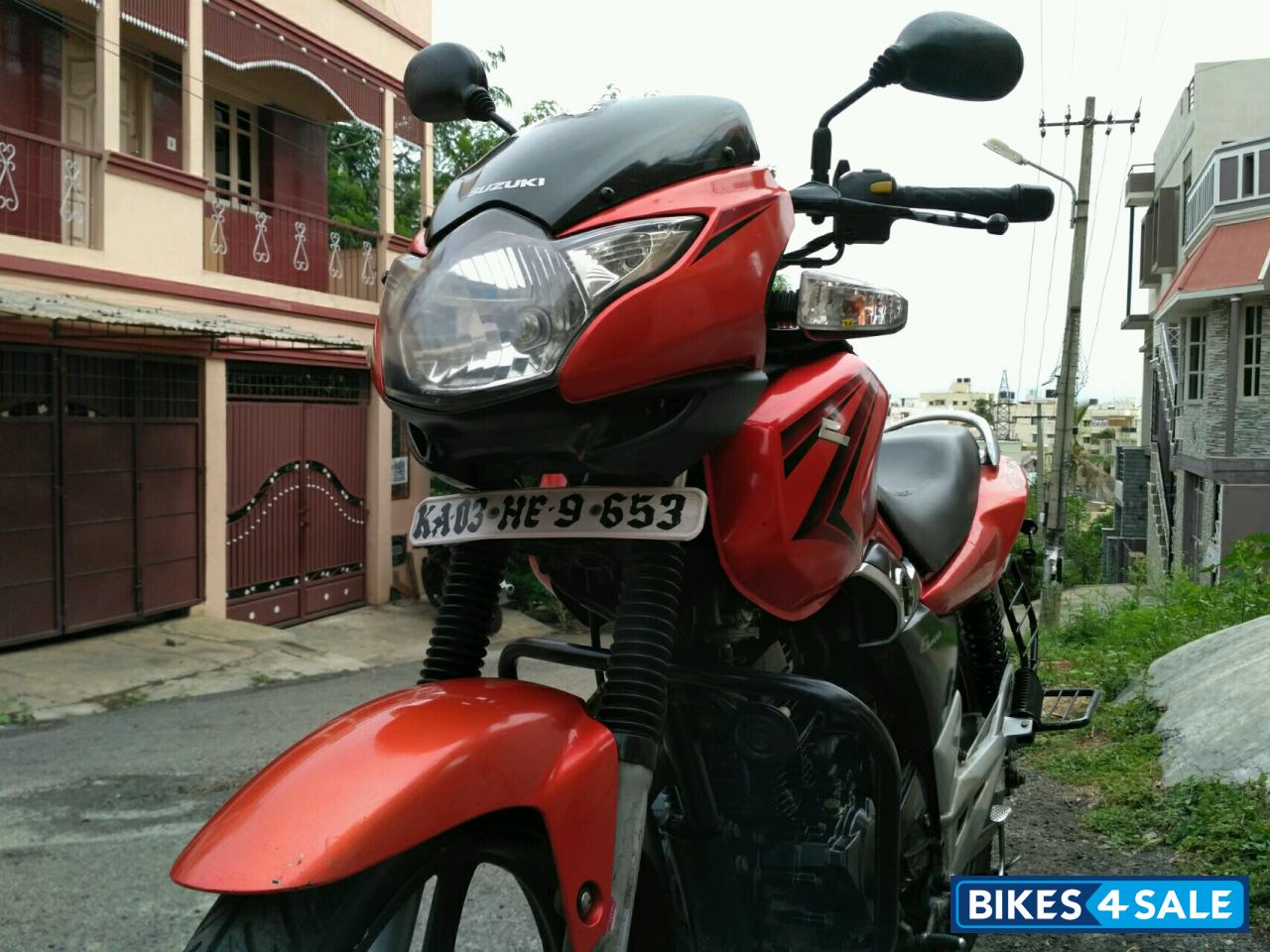 Orange Suzuki GS 150R