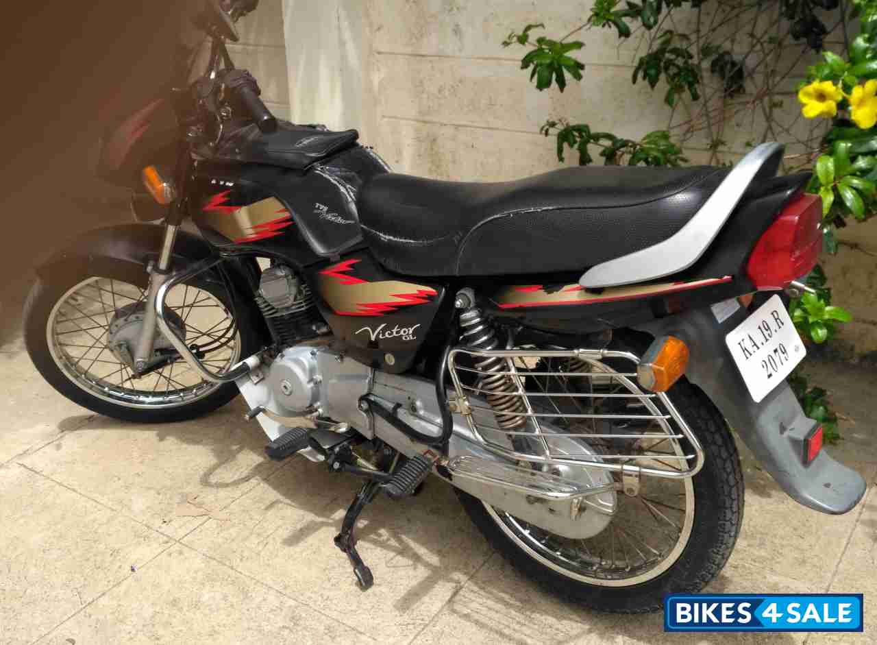 Black With Red Stripes TVS Victor