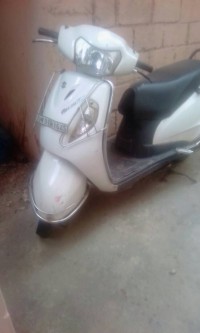White Suzuki Access 125