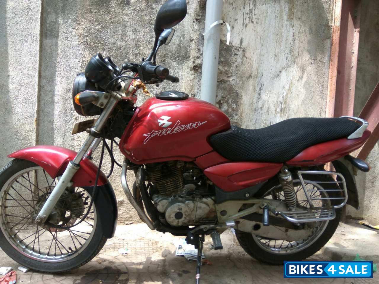 Red Bajaj Pulsar AS 150