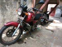 Red Bajaj Pulsar AS 150