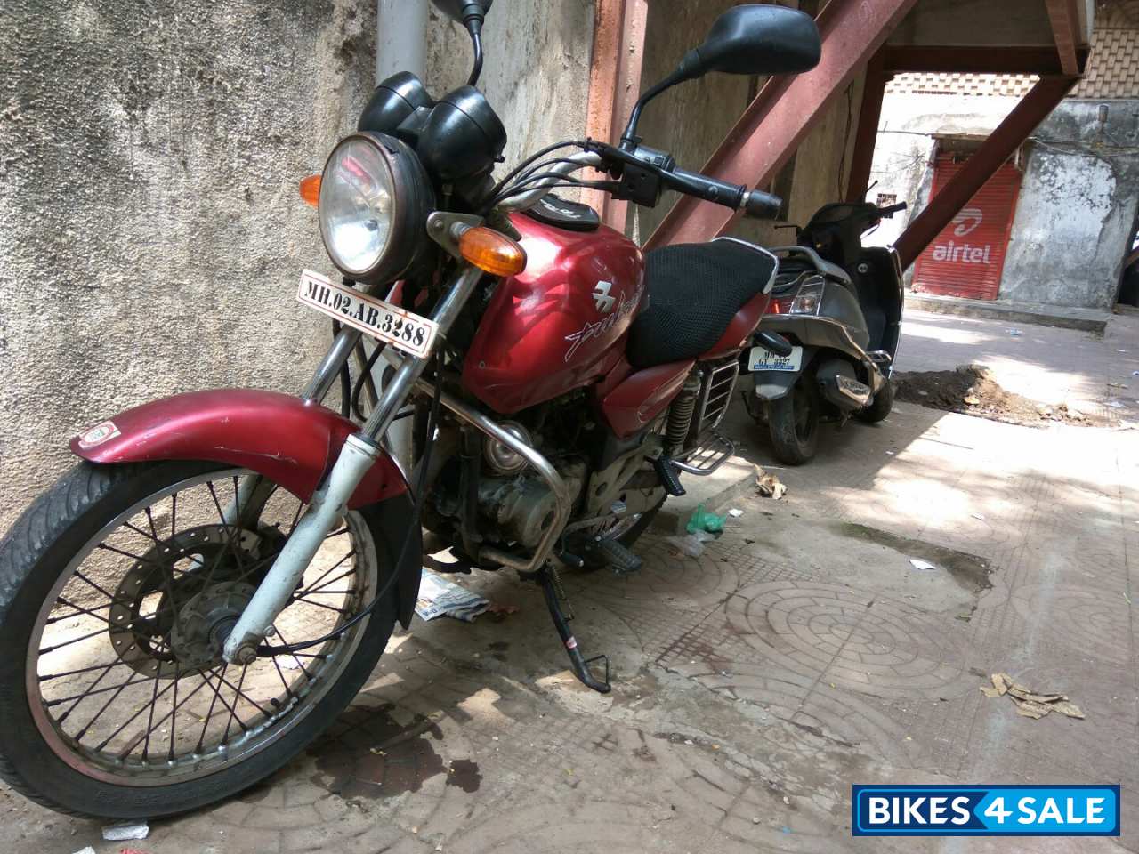 Red Bajaj Pulsar AS 150