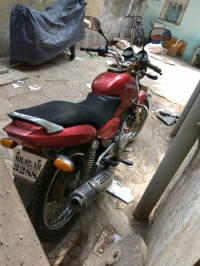 Red Bajaj Pulsar AS 150