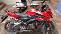 Red Bajaj Pulsar AS 150