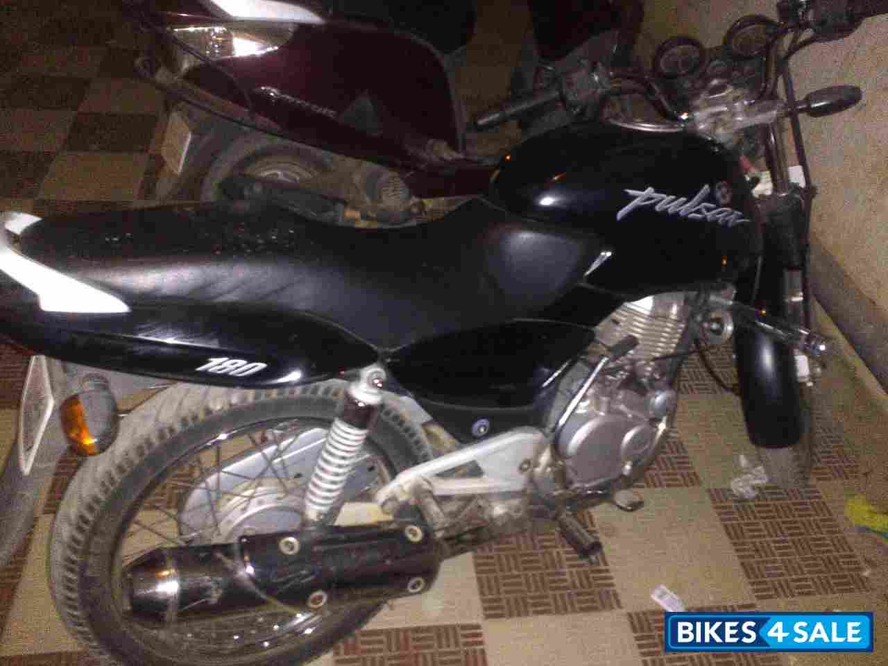 Black Bajaj Pulsar 180 Round Headlight