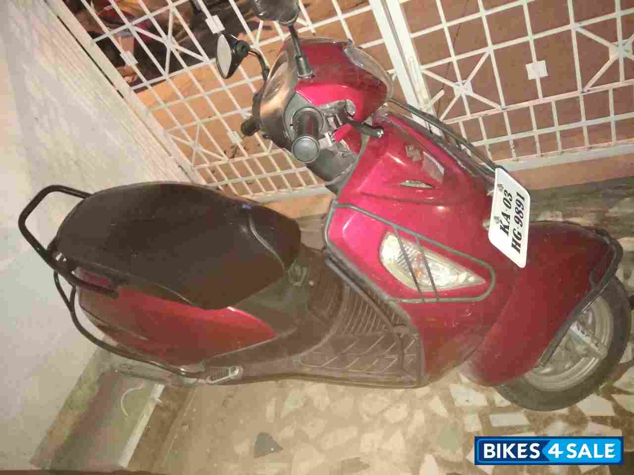 Red Suzuki Access 125