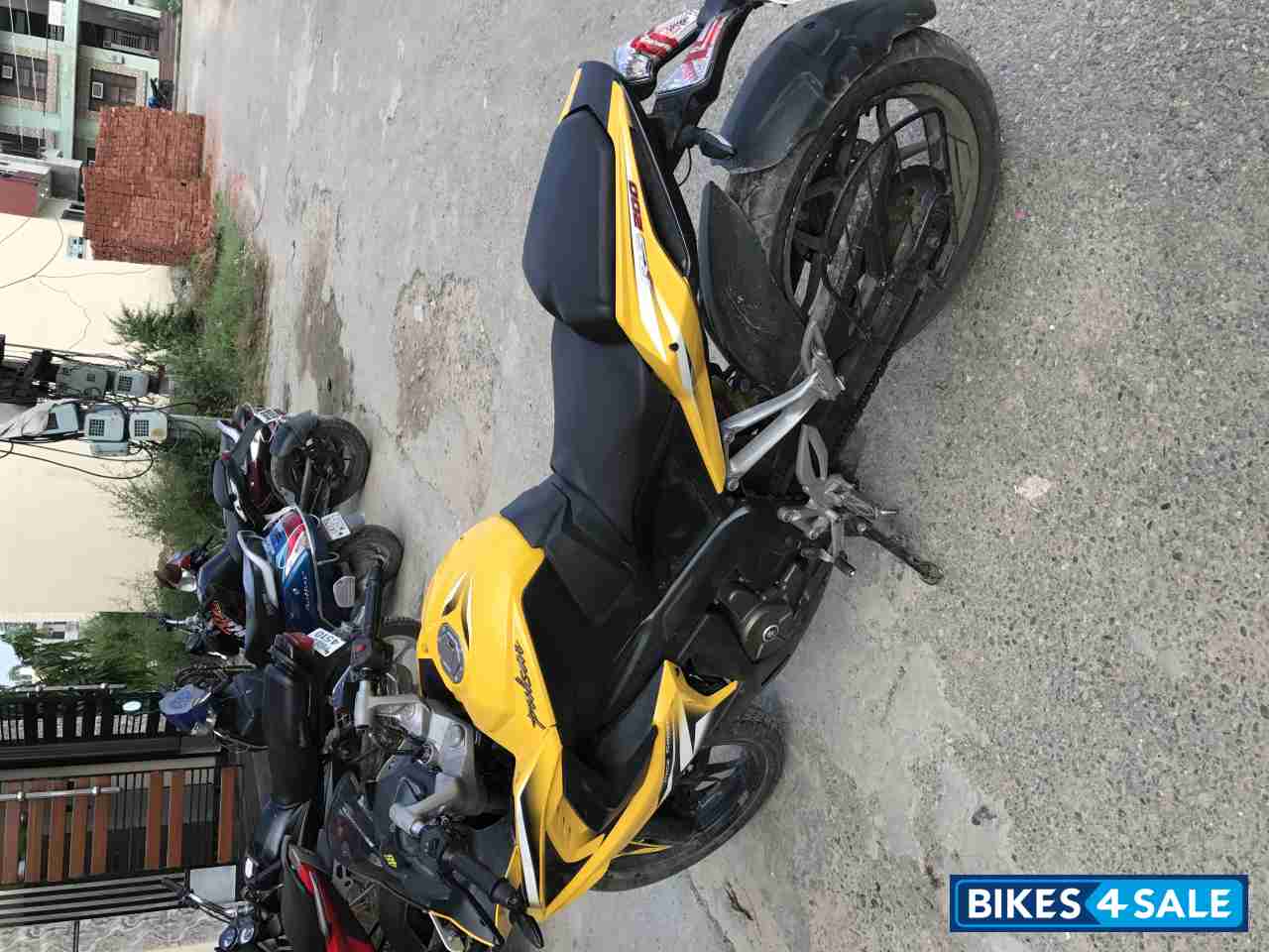 Yellow Bajaj Pulsar RS 200
