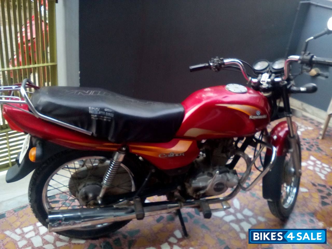 Red Bajaj Caliber