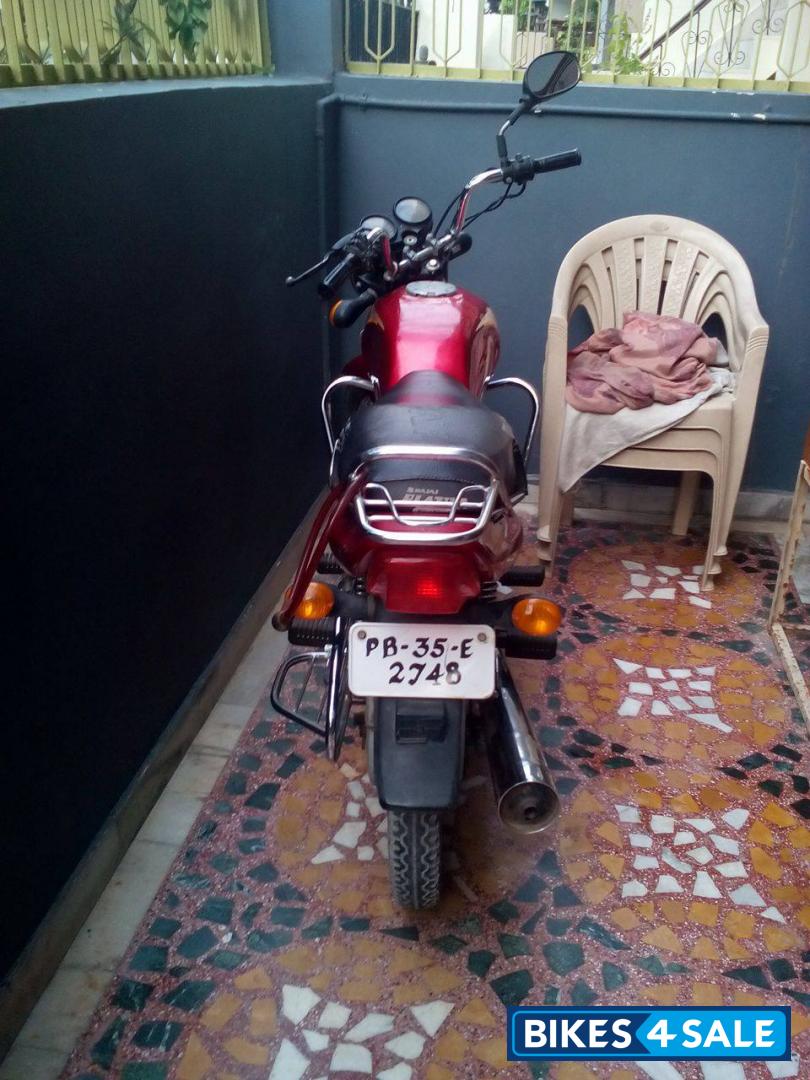 Red Bajaj Caliber