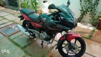 Black And Red Bajaj Pulsar 220 DTSFi