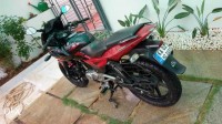 Black And Red Bajaj Pulsar 220 DTSFi