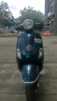 Blue Vespa LX 125