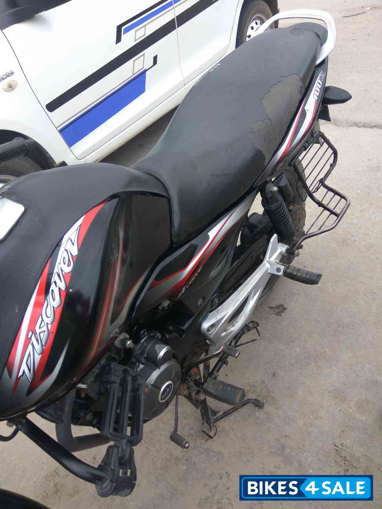 Black And Red Bajaj Discover 100M