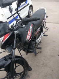 Black And Red Bajaj Discover 100M