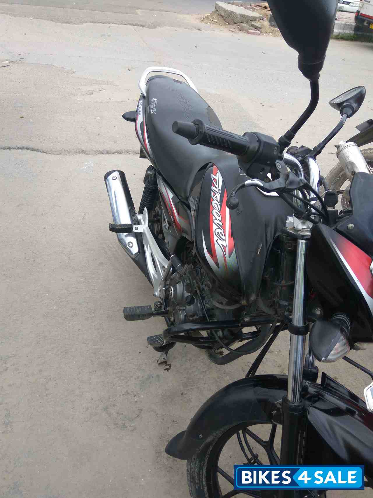 Black And Red Bajaj Discover 100M