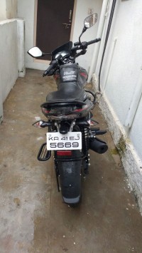 Red Bajaj Pulsar 135LS