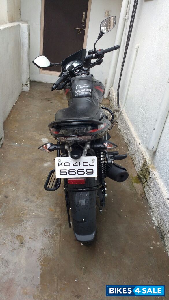 Red Bajaj Pulsar 135LS
