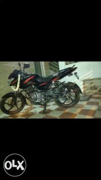 Red Bajaj Pulsar 135LS