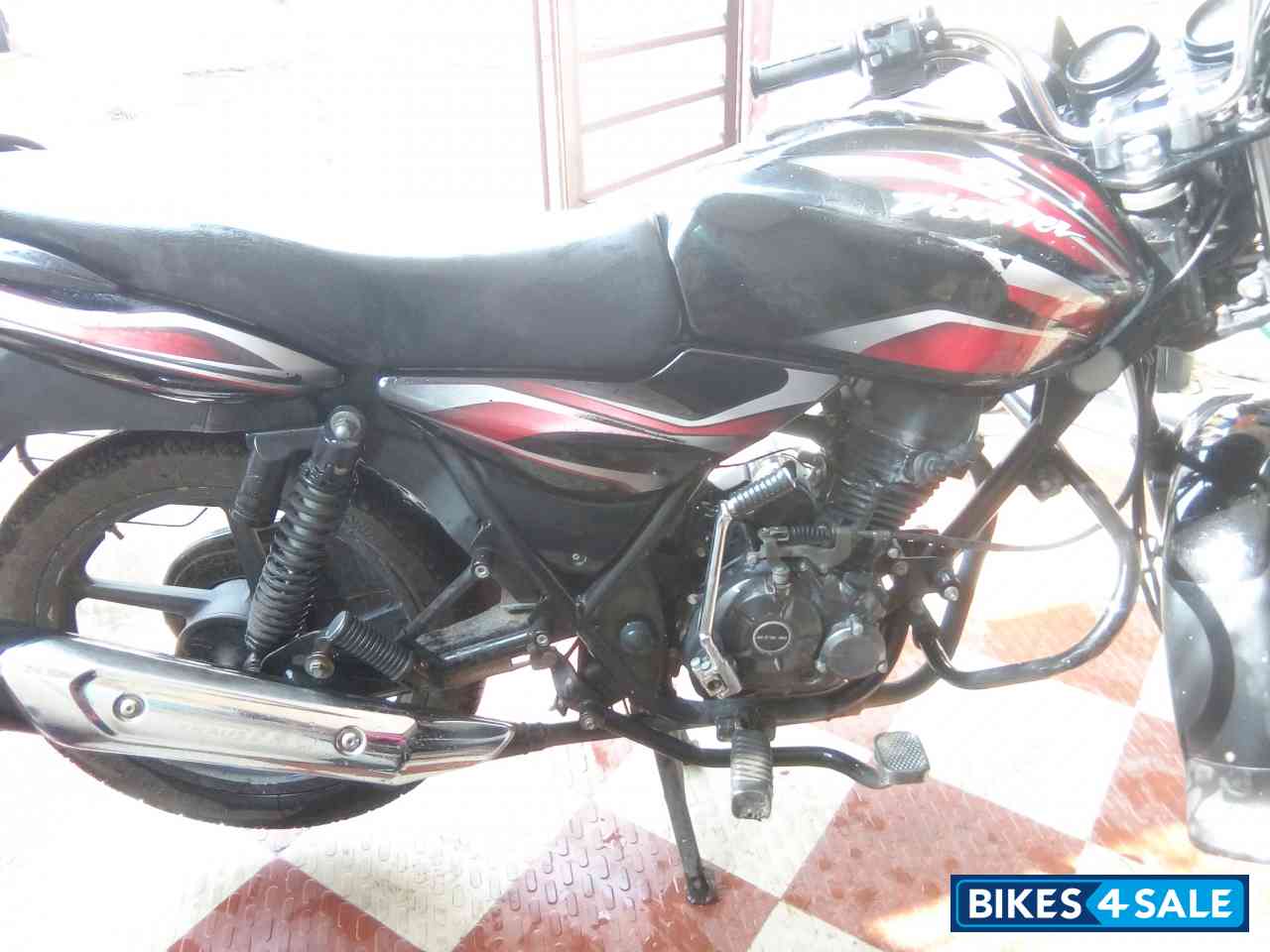 Black-red Bajaj Discover 100 DTS-Si