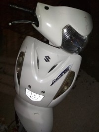 White Suzuki Access 125