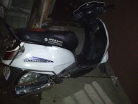 White Suzuki Access 125