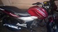 Red Bajaj Discover 125 ST