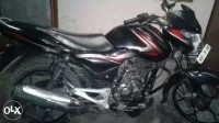 Black And Red Bajaj Discover 100M