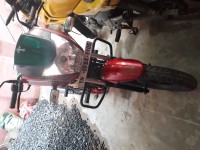 Red Mahindra Centuro NXT