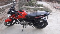 Red Bajaj Pulsar 135LS