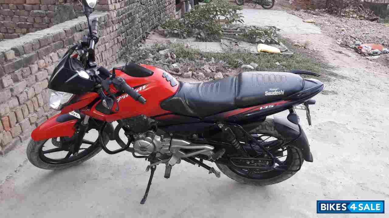 Red Bajaj Pulsar 135LS