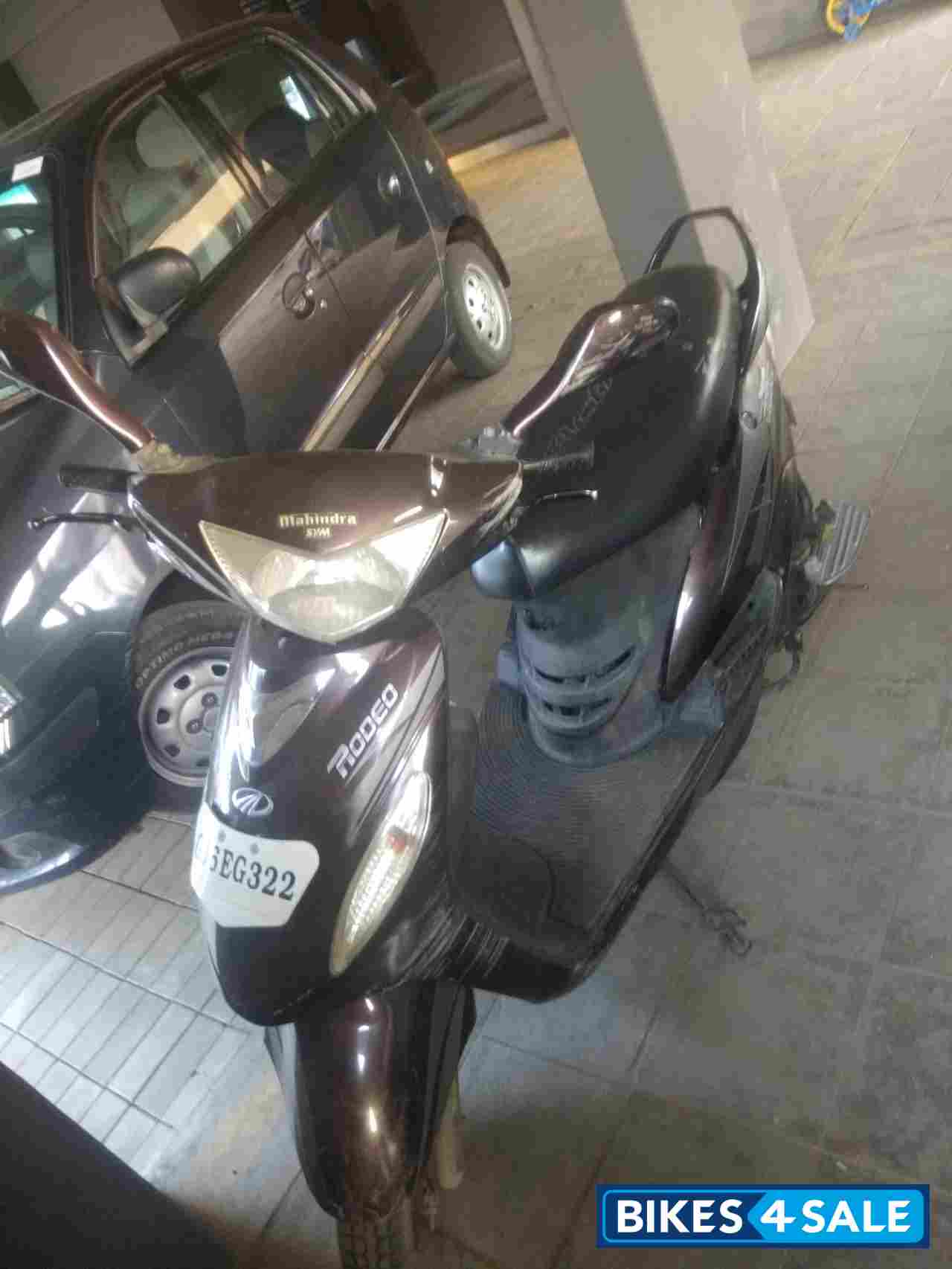 Maroon Mahindra Rodeo