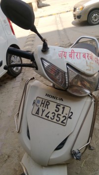 P S White Honda Activa