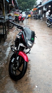 Red/black Bajaj Pulsar 150 DTSi