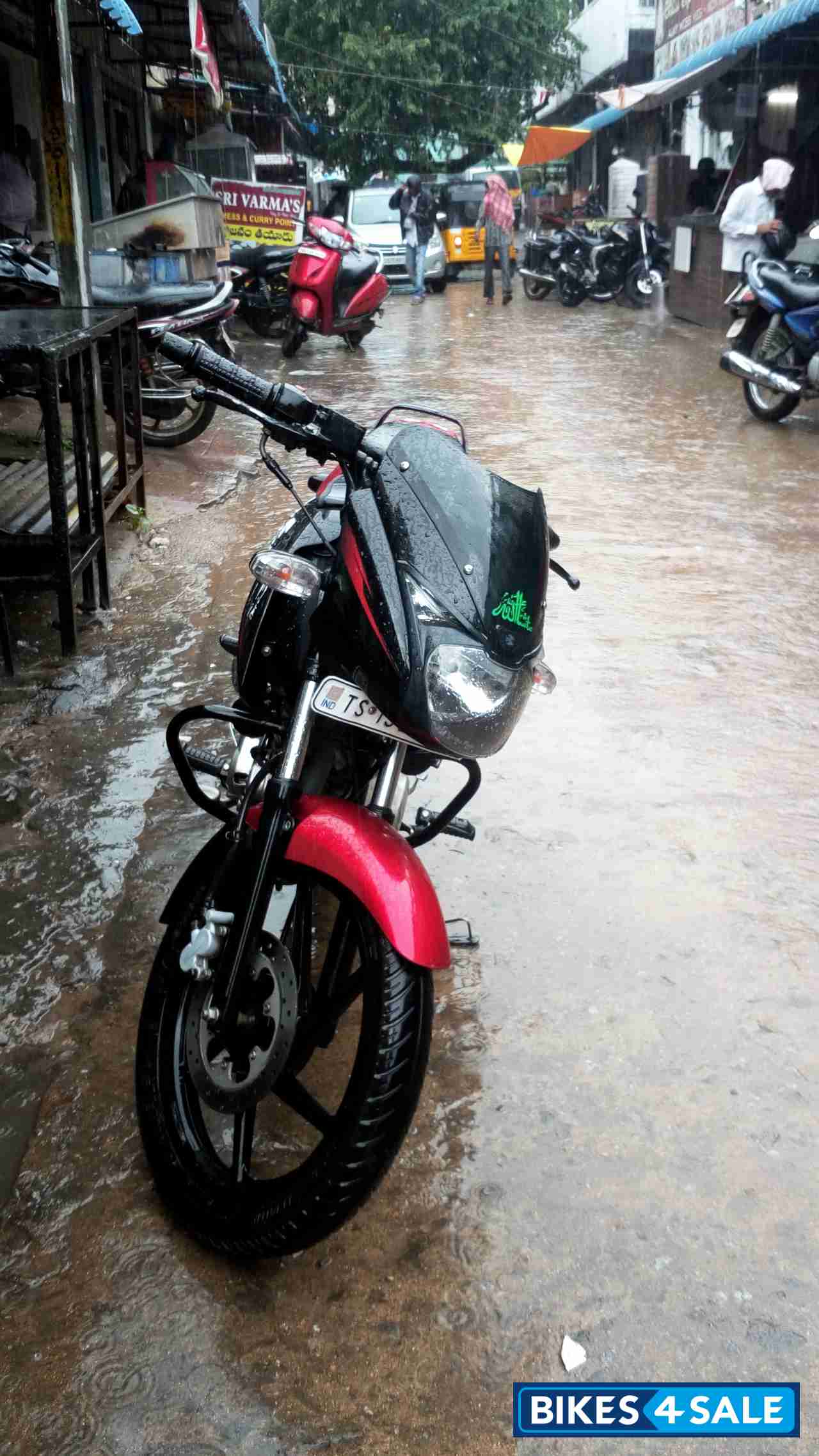 Red/black Bajaj Pulsar 150 DTSi