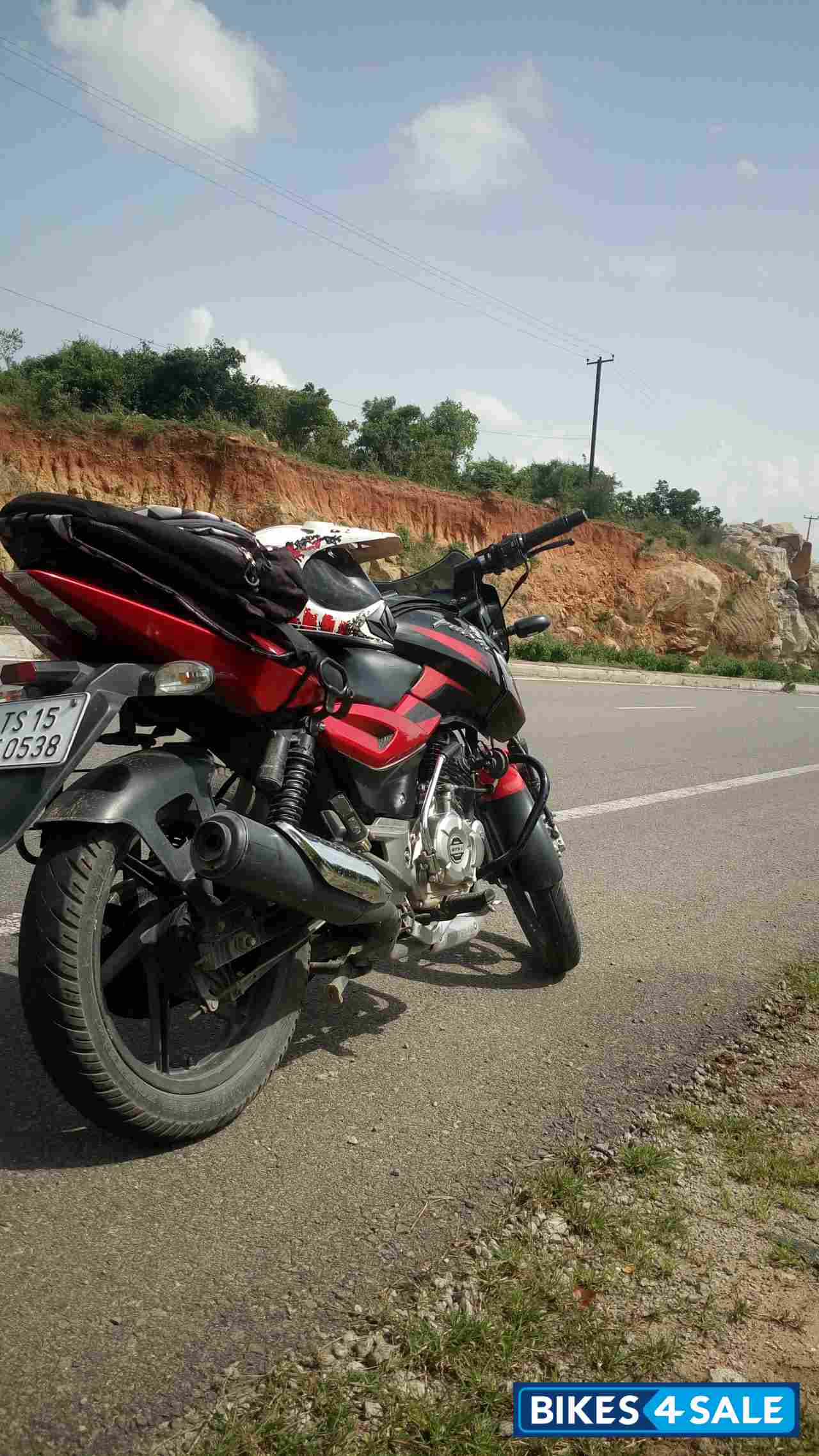 Red/black Bajaj Pulsar 150 DTSi