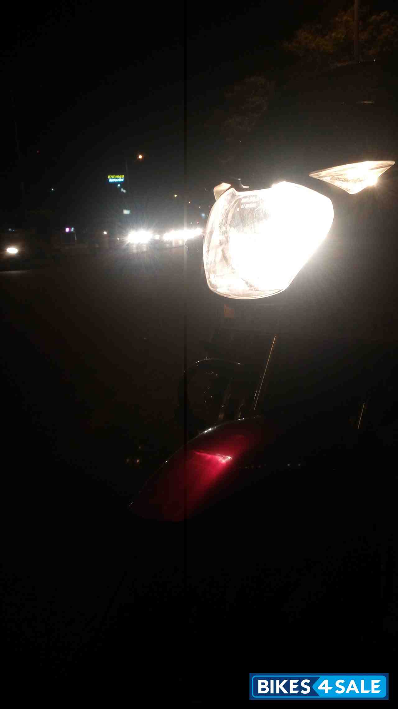 Red/black Bajaj Pulsar 150 DTSi