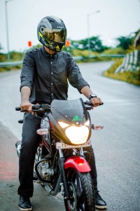 Red/black Bajaj Pulsar 150 DTSi