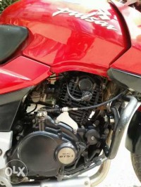Red Bajaj Pulsar 200 DTSi