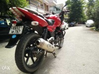 Red Bajaj Pulsar 200 DTSi