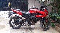 Red Bajaj Pulsar AS 150