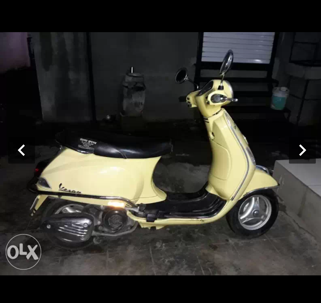 Yellow Vespa LX 125