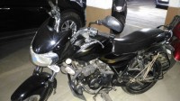 Black Bajaj Discover 150 S
